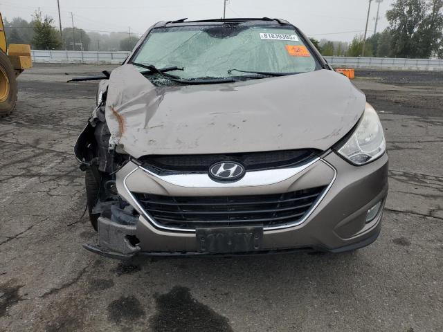 Photo 5 from auction – 2012 HYUNDAI TUCSON GLS with VIN KM8JUCAC0CU539701