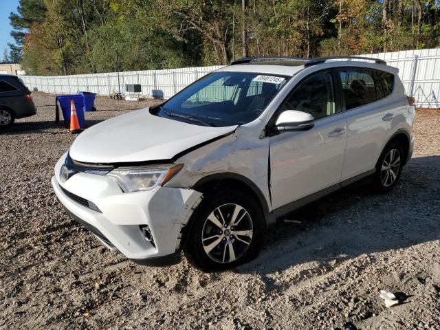 TOYOTA RAV4 XLE 2017 with VIN JTMWFREV0HJ105922 - Photo from auction