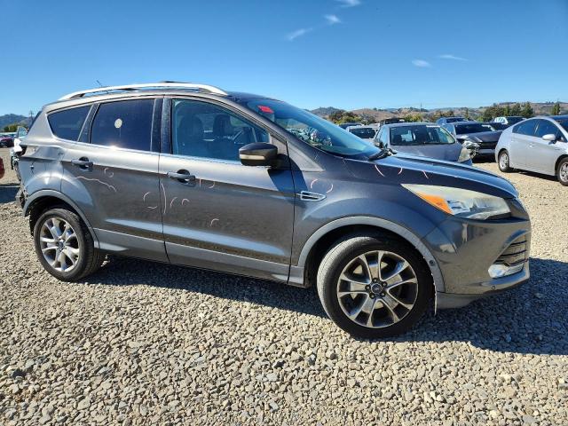 Photo 4 from auction – 2015 FORD ESCAPE TIT with VIN 1FMCU9J91FUA44170