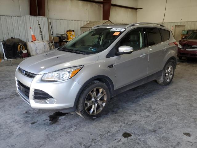 FORD ESCAPE TIT 2016 with VIN 1FMCU9JXXGUA00751 - Photo from auction