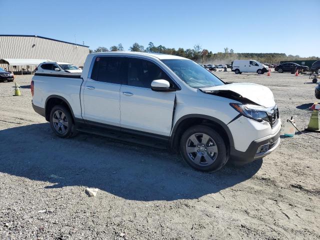 Photo 4 from auction – 2020 HONDA RIDGELINE with VIN 5FPYK3F74LB000308