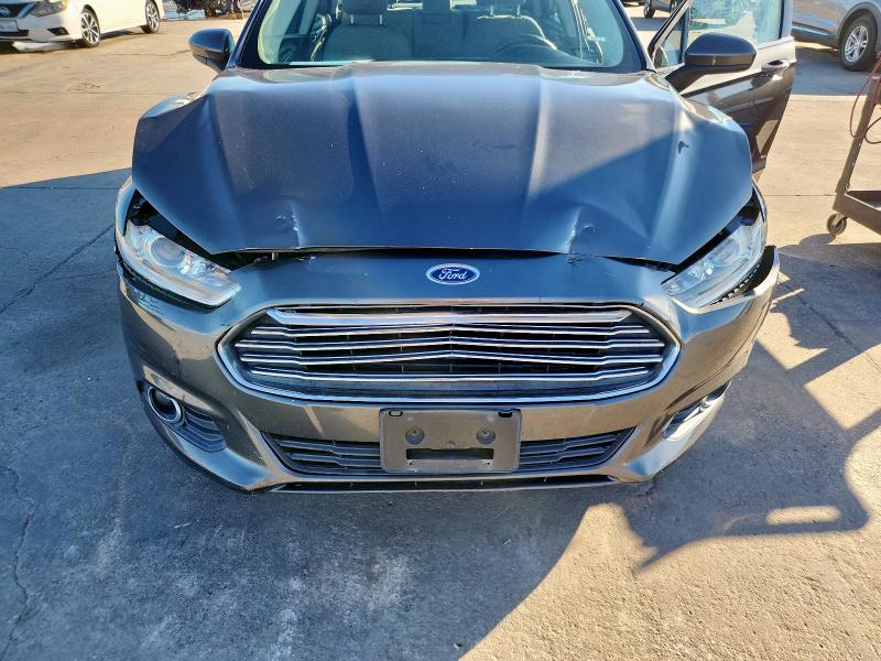Photo 11 from auction – 2016 FORD FUSION S with VIN 3FA6P0G70GR143457
