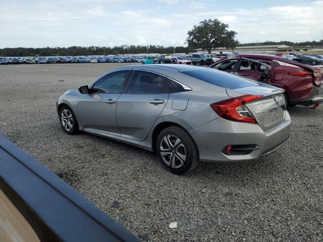 Photo 2 from auction – 2017 HONDA CIVIC LX with VIN 19XFC2F57HE040952