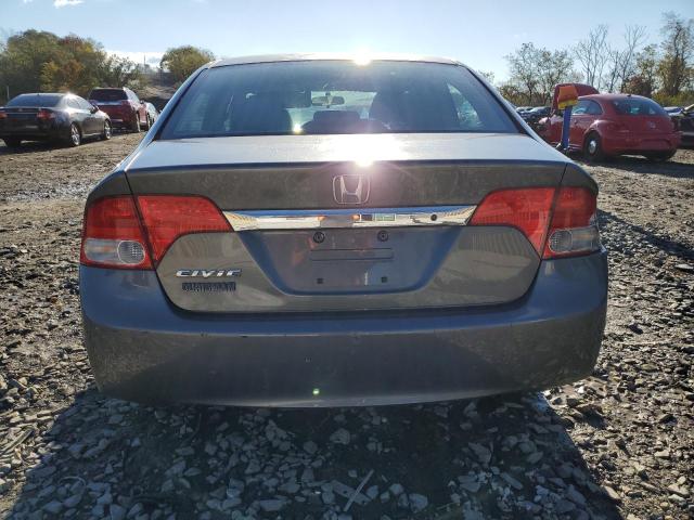 Photo 6 from auction – 2011 HONDA CIVIC LX with VIN 19XFA1F59BE033315