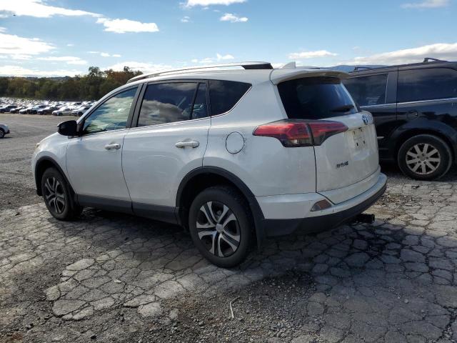 Photo 2 from auction – 2016 TOYOTA RAV4 LE with VIN JTMZFREV4GJ099585