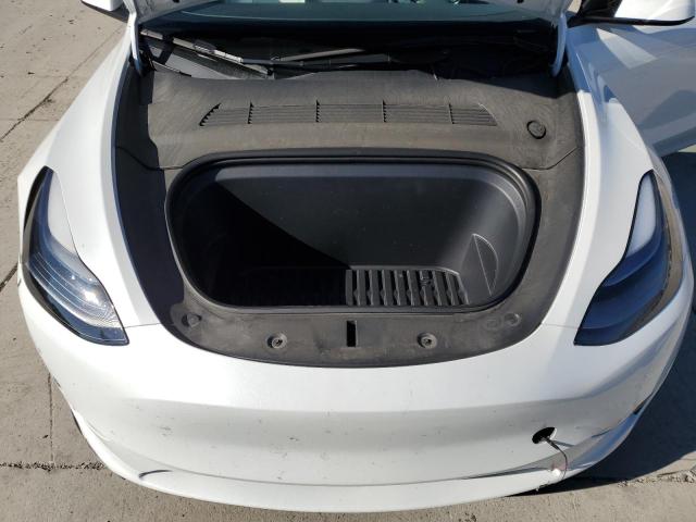 Photo 11 from auction – 2023 TESLA MODEL Y with VIN 7SAYGDEE4PF854076
