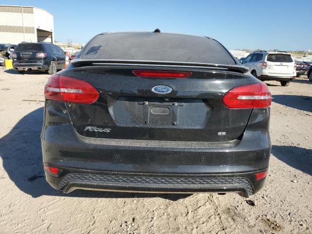 Photo 6 from auction – 2015 FORD FOCUS SE with VIN 1FADP3F21FL324532