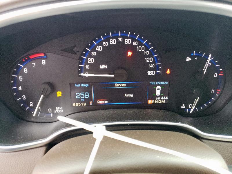 Photo 9 from auction – 2015 CADILLAC SRX with VIN 3GYFNBE32FS627188