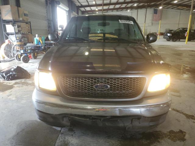 Photo 5 from auction – 2002 FORD F-150 LARI with VIN 2FTRX17W62CA49976
