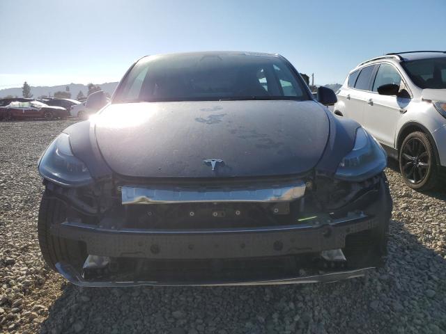 Photo 5 from auction – 2022 TESLA MODEL Y with VIN 7SAYGDEFXNF404308