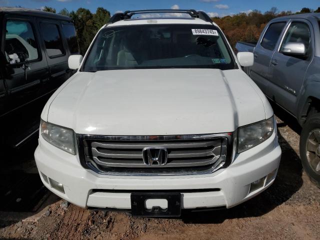 Photo 5 from auction – 2012 HONDA RIDGELINE with VIN 5FPYK1F51CB456821