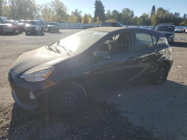 TOYOTA PRIUS C 2012 with VIN JTDKDTB32C1018567 - Photo from auction