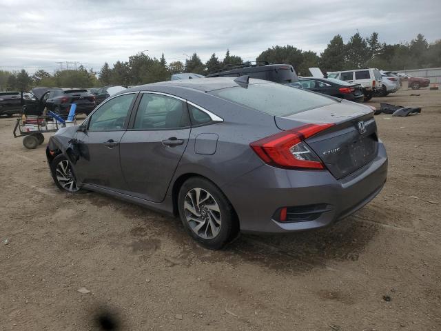 Photo 2 from auction – 2018 HONDA CIVIC EX with VIN 19XFC2F73JE003095