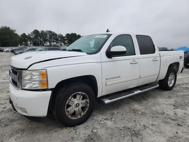 CHEVROLET SILVERADO 2011 with VIN 3GCPKTE3XBG400613 - Photo from auction