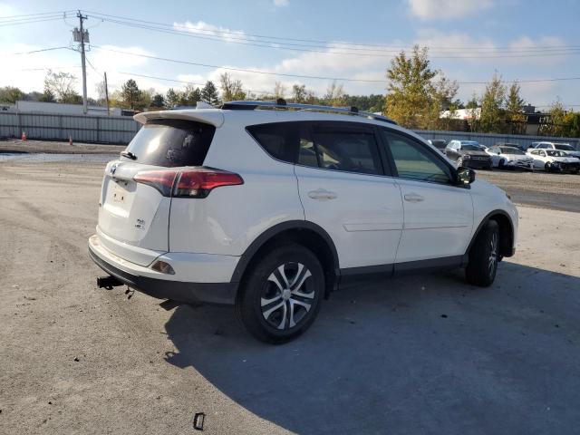 Photo 3 from auction – 2016 TOYOTA RAV4 LE with VIN JTMBFREV7GJ078375
