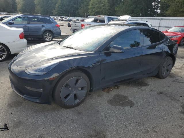 TESLA MODEL 3 2022 with VIN 5YJ3E1EB5NF352059 - Photo from auction
