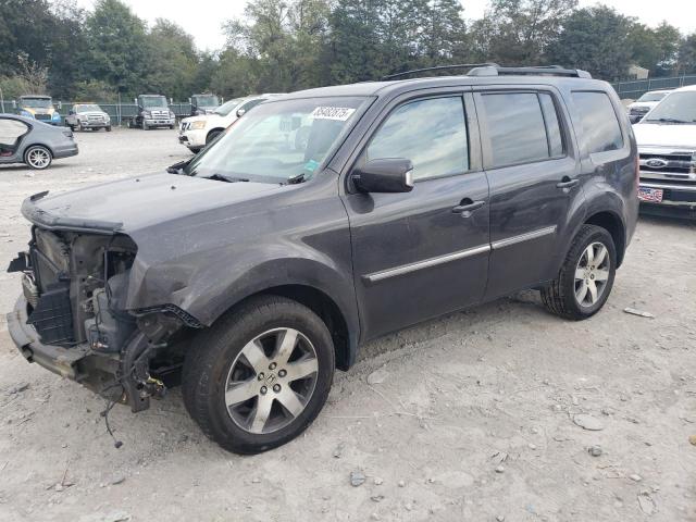 HONDA PILOT TOUR 2014 with VIN 5FNYF4H92EB052430 - Photo from auction