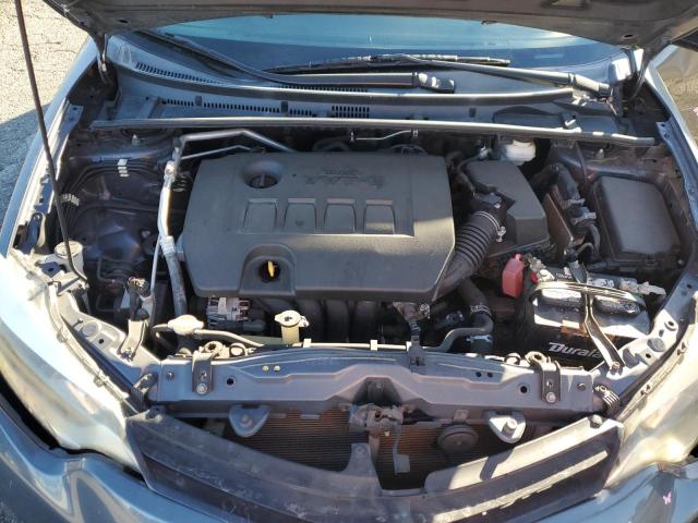 Photo 11 from auction – 2014 TOYOTA COROLLA L with VIN 5YFBURHE5EP109584