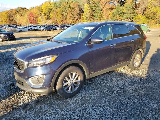 KIA SORENTO LX 2016 with VIN 5XYPGDA34GG062600 - Photo from auction