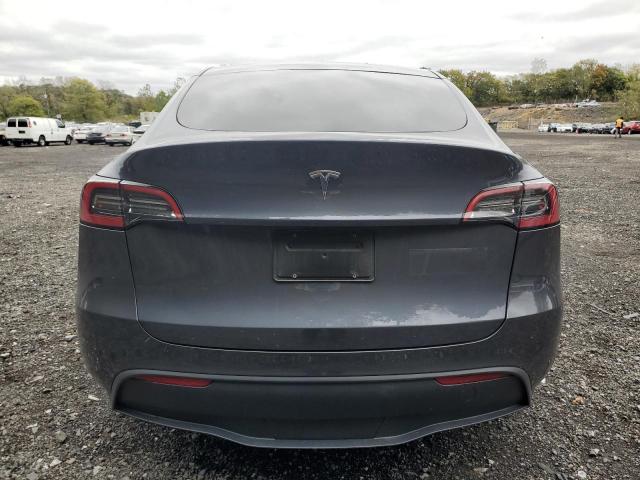 Photo 6 from auction – 2023 TESLA MODEL Y with VIN 7SAYGDED3PF932757