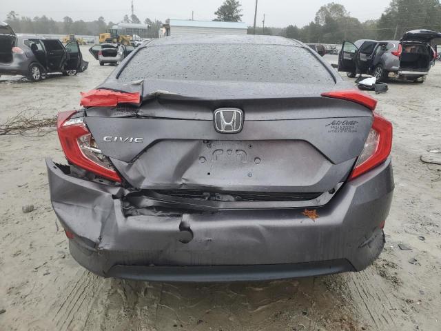 Photo 6 from auction – 2018 HONDA CIVIC LX with VIN 19XFC2F58JE202271