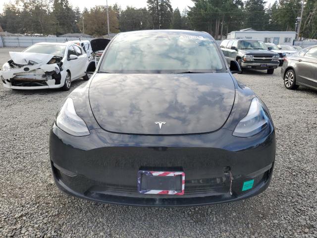 Photo 5 from auction – 2023 TESLA MODEL Y with VIN 7SAYGAEE6PF926507
