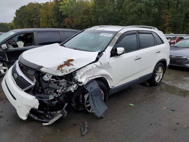 KIA SORENTO LX 2015 with VIN 5XYKTDA65FG609095 - Photo from auction