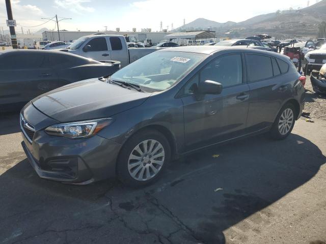 SUBARU IMPREZA 2019 with VIN 4S3GTAA6XK3727873 - Photo from auction