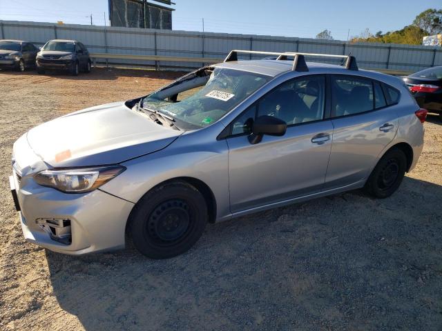 SUBARU IMPREZA 2019 with VIN 4S3GTAB6XK3721165 - Photo from auction