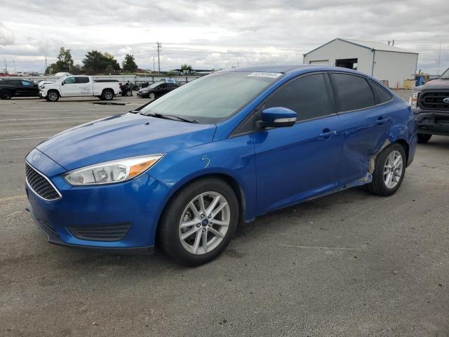 FORD FOCUS SE 2018 with VIN 1FADP3F2XJL240914 - Photo from auction