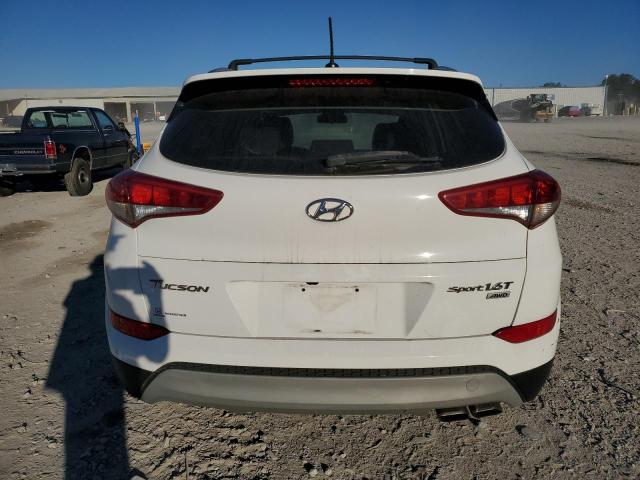 Photo 6 from auction – 2017 HYUNDAI TUCSON LIM with VIN KM8J3CA24HU278316