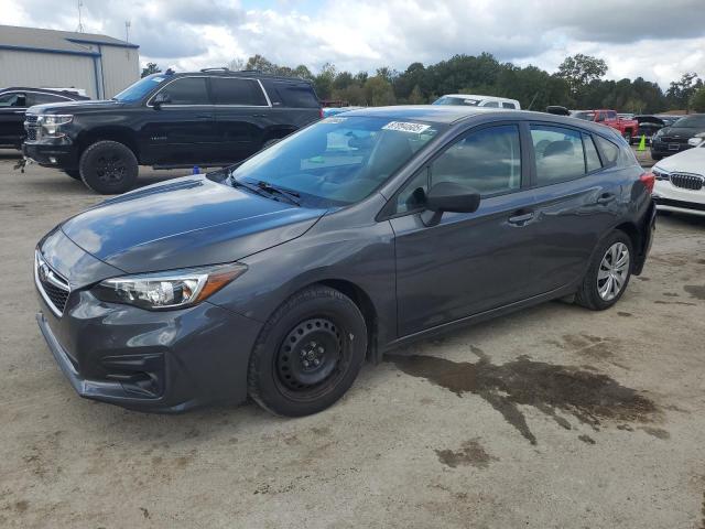 SUBARU IMPREZA 2018 with VIN 4S3GTAA62J3752331 - Photo from auction