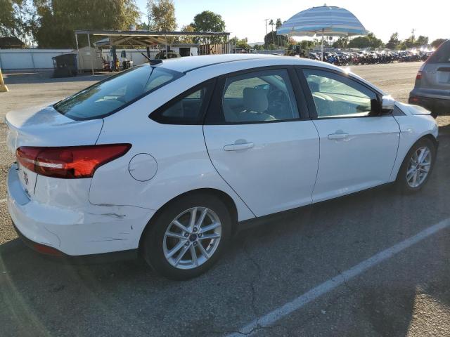 Photo 3 from auction – 2016 FORD FOCUS SE with VIN 1FADP3F28GL404928