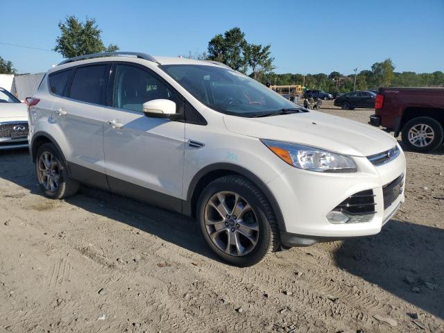Photo 4 from auction – 2014 FORD ESCAPE TITANIUM with VIN 1FMCU9J90EUD74137