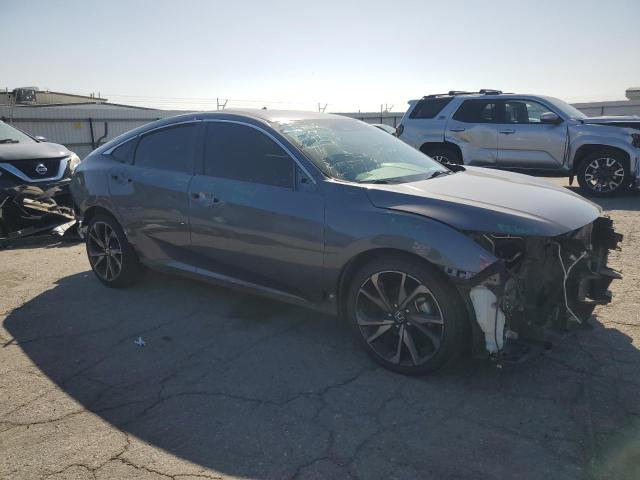 Photo 4 from auction – 2021 HONDA CIVIC SPOR with VIN 2HGFC2F86MH525948