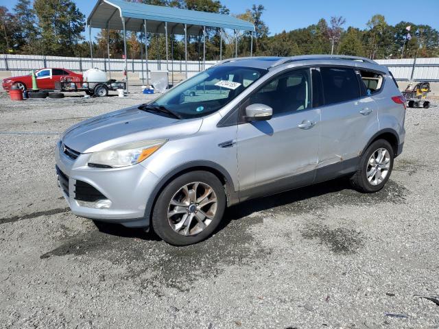 FORD ESCAPE TIT 2014 with VIN 1FMCU0JX2EUD18372 - Photo from auction