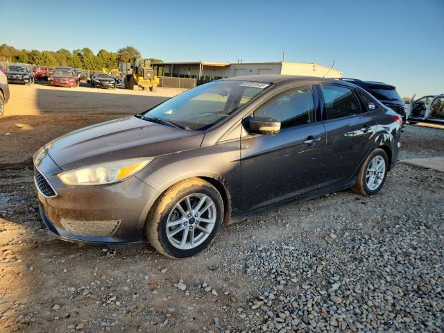 FORD FOCUS SE 2015 with VIN 1FADP3F26FL214799 - Photo from auction