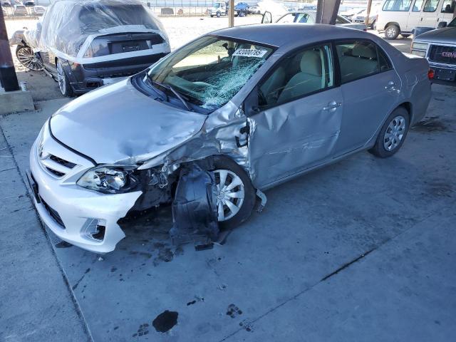 TOYOTA COROLLA BASE 2011 with VIN JTDBU4EE7B9151697 - Photo from auction