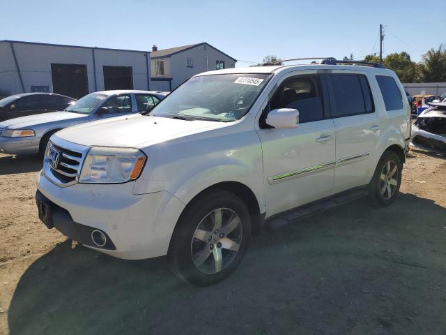 HONDA PILOT TOUR 2013 with VIN 5FNYF4H98DB076049 - Photo from auction