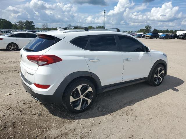 Photo 3 from auction – 2016 HYUNDAI TUCSON LIM with VIN KM8J33A25GU201341