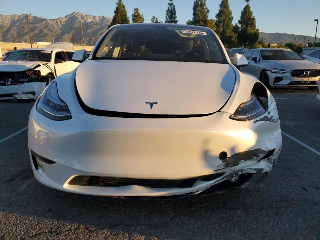 Photo 5 from auction – 2023 TESLA MODEL Y with VIN 7SAYGDEE0PA063735