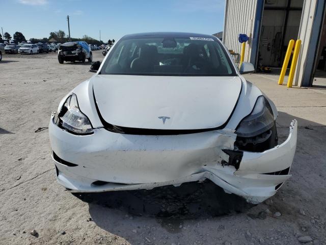 Photo 5 from auction – 2021 TESLA MODEL 3 with VIN 5YJ3E1EA3MF985777