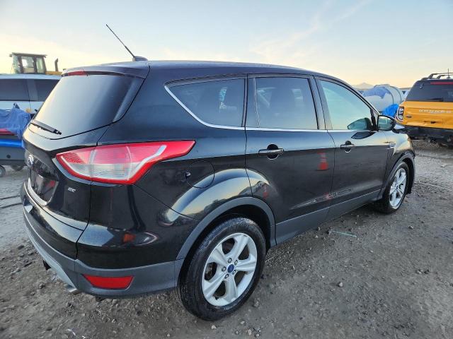 Photo 3 from auction – 2016 FORD ESCAPE SE with VIN 1FMCU0G74GUA70281