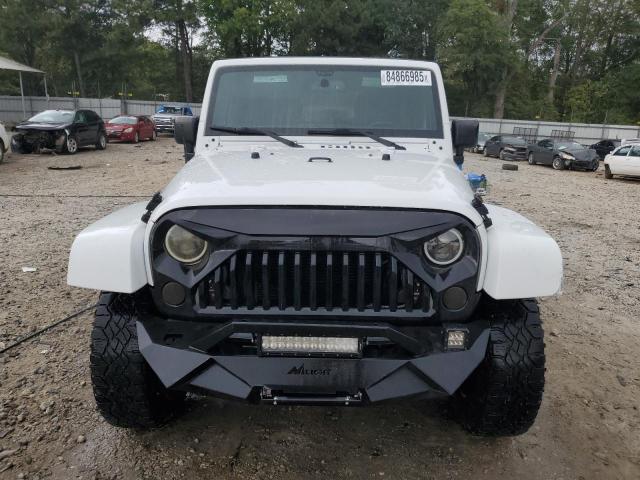 Photo 5 from auction – 2016 JEEP WRANGLER U with VIN 1C4BJWEG8GL243157