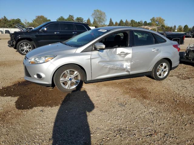 FORD FOCUS SE 2014 with VIN 1FADP3F20EL122828 - Photo from auction