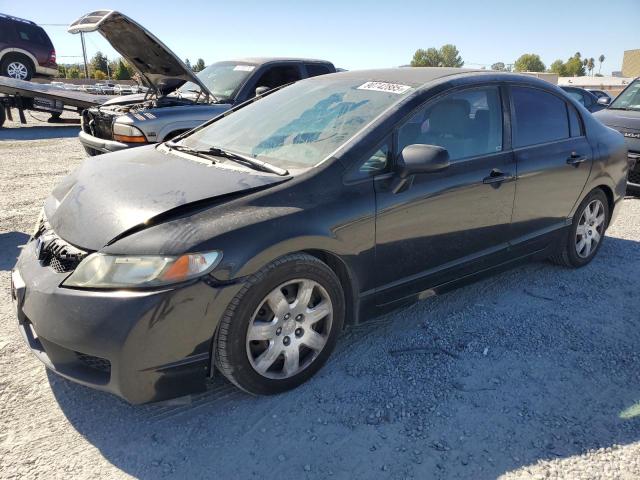 HONDA CIVIC LX 2011 with VIN 2HGFA1F53BH543228 - Photo from auction
