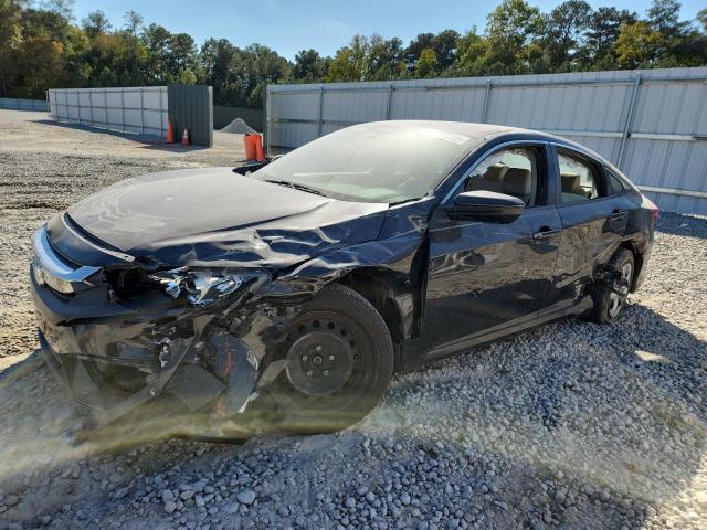 HONDA CIVIC 2016 with VIN 19XFC2F50GE063844 - Photo from auction