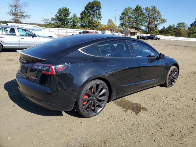 Photo 3 from auction – 2020 TESLA MODEL 3 with VIN 5YJ3E1EC7LF784612