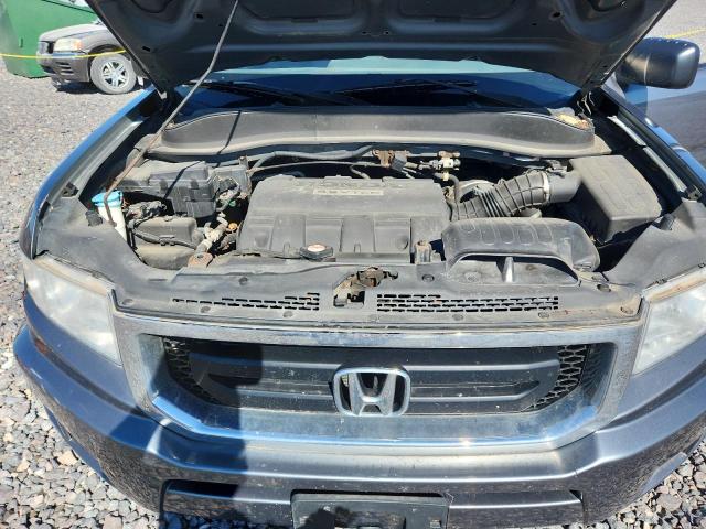 Photo 11 from auction – 2010 HONDA RIDGELINE with VIN 5FPYK1F28AB012385