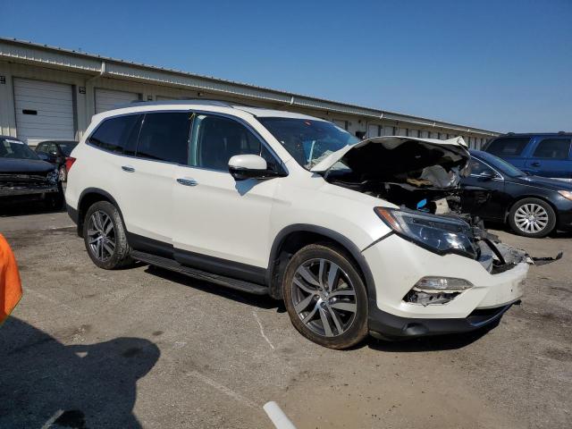 Photo 4 from auction – 2017 HONDA PILOT TOURING with VIN 5FNYF6H9XHB021104